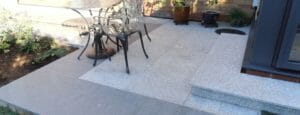 raven grey and dove white granite flamed exfoliated pavers alfresco area