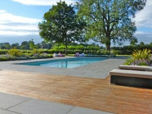 raven grey granite flamed exfoliated pool pavers and pool coping tiles